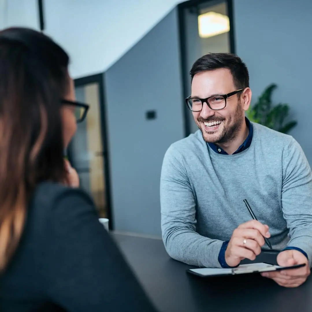 A PurpleTree advisor in conversation with a client